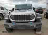 2024 Jeep Wrangler Rubicon z VIN 1C4RJXR69RW255776, wystawiony jako Copart lot #81444315 z przebiegiem 11 461 mil mil oraz Szkoda całkowita • Salvage title. Historia ofert i sprzedaży dostępna na DreamBid. Obrazek 5.
