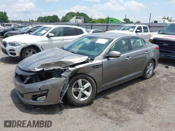 2014 Kia Optima LX with VIN 5XXGM4A7XEG313486, listed as a IAAI auction lot 42517437 with 70,444 mi miles and . Bid and sale history available at DreamBid. Image 2.
