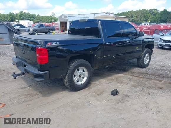 2014 Chevrolet Silverado 1500 LTZ with VIN 3GCUKSEC1EG311188, listed as a IAAI auction lot 42772149 with 141,404 mi miles and . Bid and sale history available at DreamBid. Image 4.