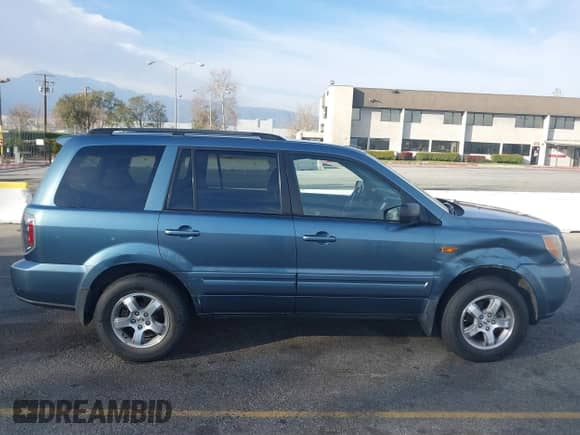 2006 Honda Pilot EX-L z VIN 5FNYF28706B035145, wystawiony jako IAAI lot #41608774 z przebiegiem 96 638 mil mil oraz . Historia ofert i sprzedaży dostępna na DreamBid. Obrazek 13.