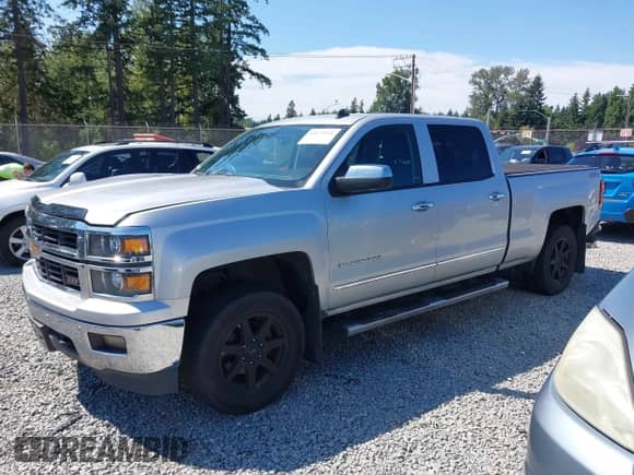 2014 Chevrolet Silverado 1500 LTZ with VIN 1GCUKSEC4EF197043, listed as a IAAI auction lot 42673341 with 131,445 mi miles and . Bid and sale history available at DreamBid. Image 14.