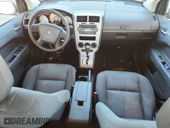 2008 Dodge Caliber SE with VIN 1B3HB28B38D659372, listed as a Copart auction lot 70232255 with 223,099 mi miles and Clean title. Bid and sale history available at DreamBid. Image 8.