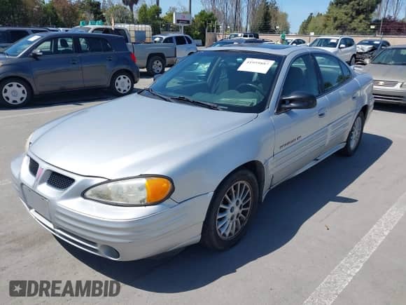 2001 Pontiac Grand Am SE1 z VIN 1G2NF52T81M550988, wystawiony jako IAAI lot #41959887 z przebiegiem 212 819 mil mil oraz . Historia ofert i sprzedaży dostępna na DreamBid. Obrazek 6.