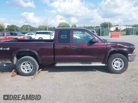 2004 Dodge Dakota SLT с VIN 1D7HG42N34S608867, выставлен на аукционе IAAI как лот 43287759 с пробегом 49 092 миль миль и . История ставок и продаж доступна на DreamBid. Изображение 13.