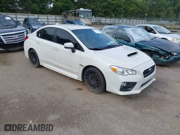 2015 Subaru WRX with VIN JF1VA1A6XF9803064, listed as a IAAI auction lot 43054162 with 89,958 mi miles and . Bid and sale history available at DreamBid. Image 1.