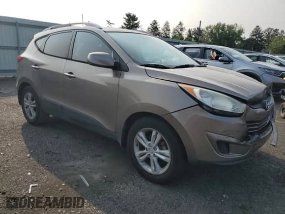 2011 Hyundai Tucson GLS с VIN KM8JU3AC6BU196861, выставлен на аукционе Copart как лот 68093865 с пробегом 165 159 миль миль и Списание • Salvage title. История ставок и продаж доступна на DreamBid. Изображение 4.