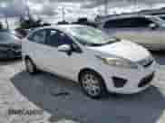 2012 Ford Fiesta SE with VIN 3FADP4BJ0CM218571, listed as a Copart auction lot 82151155 with 174,595 mi miles and Clean title. Bid and sale history available at DreamBid. Image 4.