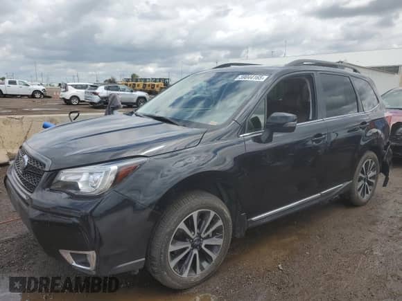 2017 Subaru Forester Touring z VIN JF2SJGWC2HH432961, wystawiony jako Copart lot #59044165 z przebiegiem 58 716 mil mil oraz Szkoda całkowita • Salvage title. Historia ofert i sprzedaży dostępna na DreamBid. Obrazek 1.