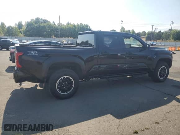 2024 Toyota Tacoma SR5 with VIN 3TMLB5JN9RM036603, listed as a Copart auction lot 80685075 with 4,301 mi miles and Salvage title. Bid and sale history available at DreamBid. Image 3.