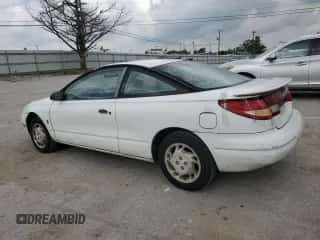 1997 Saturn SC с VIN 1G8ZF1282VZ133256, выставлен на аукционе Copart как лот 74026354 с пробегом 84 564 миль миль и Списание • Salvage title. История ставок и продаж доступна на DreamBid. Изображение 2.