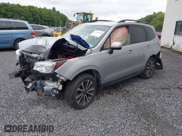 2018 Subaru Forester Premium with VIN JF2SJGEC8JH449707, listed as a IAAI auction lot 42646139 with 103,000 mi miles and . Bid and sale history available at DreamBid. Image 2.