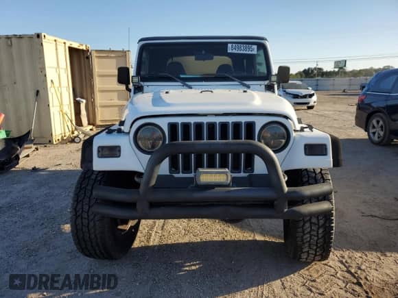 1999 Jeep Wrangler Sport with VIN 1J4FY19SXXP412760, listed as a Copart auction lot 84983895 with 180,172 mi miles and Clean title. Bid and sale history available at DreamBid. Image 5.