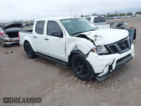2020 Nissan Frontier SV with VIN 1N6ED0EA0LN705624, listed as a IAAI auction lot 42206274 with 52,511 mi miles and . Bid and sale history available at DreamBid. Image 1.