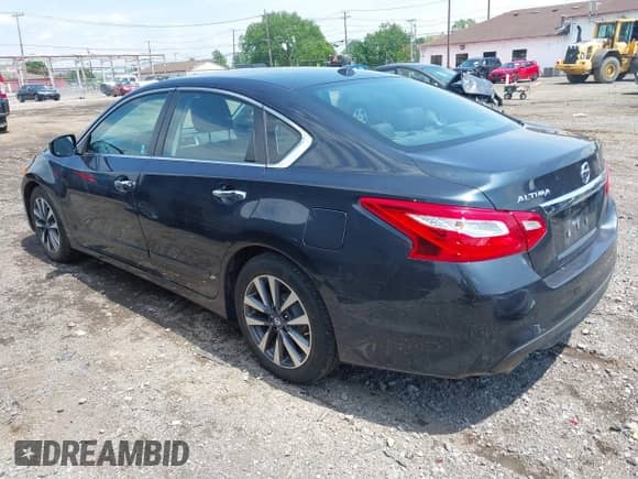 2016 Nissan Altima S with VIN 1N4AL3AP0GC137737, listed as a IAAI auction lot 42616646 with 124,764 mi miles and . Bid and sale history available at DreamBid. Image 3.