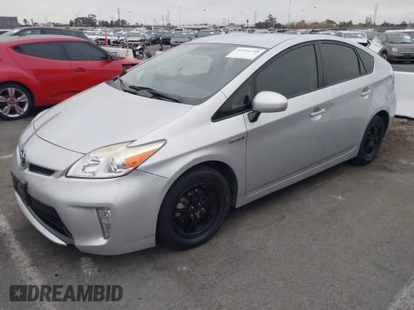 2015 Toyota Prius Two with VIN JTDKN3DU6F1937284, listed as a IAAI auction lot 43331218 with 215,757 mi miles and . Bid and sale history available at DreamBid. Image 2.