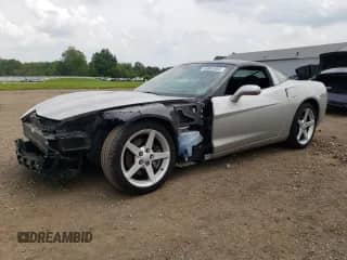 2005 Chevrolet Corvette with VIN 1G1YY24U955131029, listed as a Copart auction lot 63802685 with 122,059 mi miles and Salvage title. Bid and sale history available at DreamBid. Image 1.