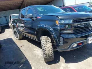 2021 Chevrolet Silverado 1500 LT Trail Boss z VIN 3GCPYFEL2MG223896, wystawiony jako IAAI lot #42156211 z przebiegiem 108 623 mil mil oraz . Historia ofert i sprzedaży dostępna na DreamBid. Obrazek 1.