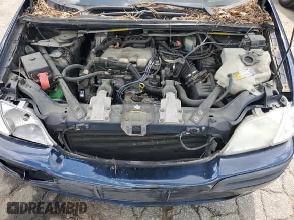 2002 Chevrolet Venture Plus 1SB z VIN 1GNDX03E62D144899, wystawiony jako Copart lot #59550085 z przebiegiem 165 041 mil mil oraz Czysty tytuł • Clean title. Historia ofert i sprzedaży dostępna na DreamBid. Obrazek 12.