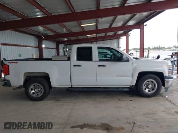 2014 Chevrolet Silverado 1500 Work Truck z VIN 1GCVKPEH7EZ313525, wystawiony jako IAAI lot #41825247 z przebiegiem 227 392 mil mil oraz . Historia ofert i sprzedaży dostępna na DreamBid. Obrazek 13.