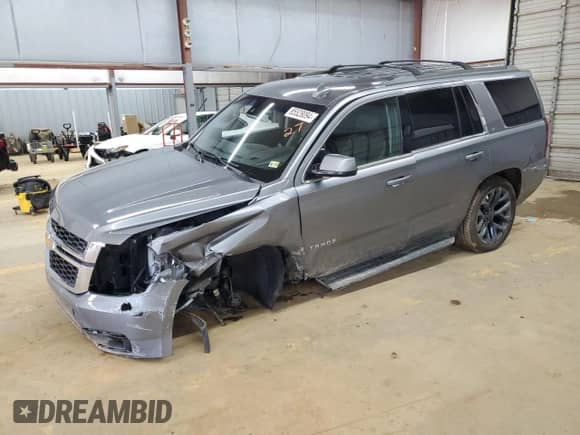 2020 Chevrolet Tahoe LT z VIN 1GNSKBKC0LR214581, wystawiony jako Copart lot #85528094 z przebiegiem Nie podano mil oraz Szkoda całkowita • Salvage title. Historia ofert i sprzedaży dostępna na DreamBid. Obrazek 1.