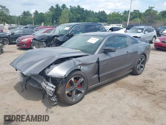 2014 Ford Mustang Premium with VIN 1ZVBP8AM5E5270918, listed as a IAAI auction lot 42807083 with 111,001 mi miles and . Bid and sale history available at DreamBid. Image 2.