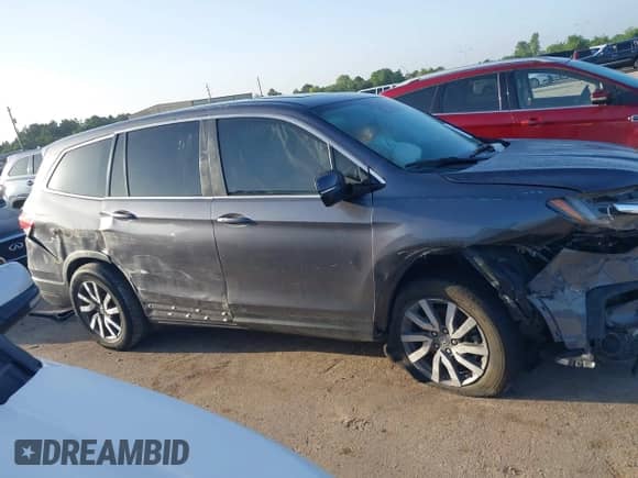 2022 Honda Pilot EX-L with VIN 5FNYF5H53NB007760, listed as a IAAI auction lot 42770899 with Not provided miles and . Bid and sale history available at DreamBid. Image 13.