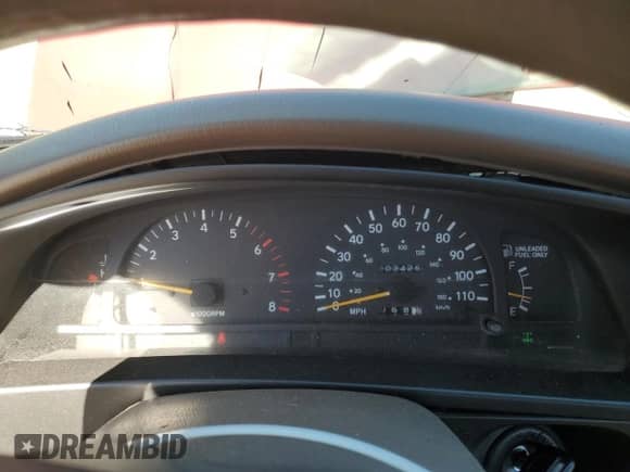 1996 Toyota Tacoma z VIN 4TAPM62N7TZ136944, wystawiony jako Copart lot #82388415 z przebiegiem 203 425 mil mil oraz Szkoda całkowita • Salvage title. Historia ofert i sprzedaży dostępna na DreamBid. Obrazek 9.
