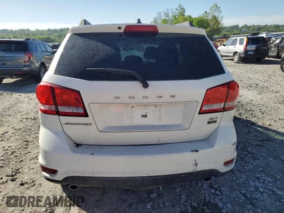 2015 Dodge Journey SXT with VIN 3C4PDCBGXFT637200, listed as a Copart auction lot 57106525 with 138,142 mi miles and Salvage title. Bid and sale history available at DreamBid. Image 6.