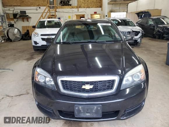 2012 Chevrolet Caprice Police Police with VIN 6G1MK5U21CL660129, listed as a Copart auction lot 79311404 with 164,734 mi miles and Salvage title. Bid and sale history available at DreamBid. Image 5.
