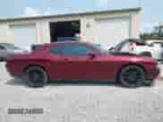 2020 Dodge Challenger SXT z VIN 2C3CDZAG5LH226556, wystawiony jako IAAI lot #43154137 z przebiegiem 91 789 mil mil oraz . Historia ofert i sprzedaży dostępna na DreamBid. Obrazek 13.