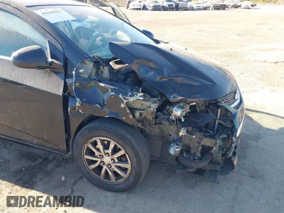 2018 Chevrolet Sonic LT with VIN 1G1JD5SB8J4121320, listed as a IAAI auction lot 40604581 with 97,602 mi miles and . Bid and sale history available at DreamBid. Image 6.