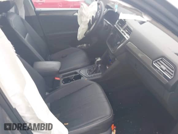 2023 Volkswagen Tiguan SE with VIN 3VV3B7AX9PM055390, listed as a IAAI auction lot 42480348 with 30,571 mi miles and . Bid and sale history available at DreamBid. Image 5.