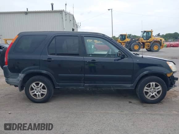 2002 Honda CR-V EX with VIN JHLRD78842C032677, listed as a IAAI auction lot 43146653 with 244,436 mi miles and . Bid and sale history available at DreamBid. Image 14.