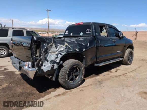 2012 Toyota Tundra z VIN 5TFRU5F10CX028076, wystawiony jako Copart lot #50353735 z przebiegiem 171 321 mil mil oraz Szkoda całkowita • Salvage title. Historia ofert i sprzedaży dostępna na DreamBid. Obrazek 3.