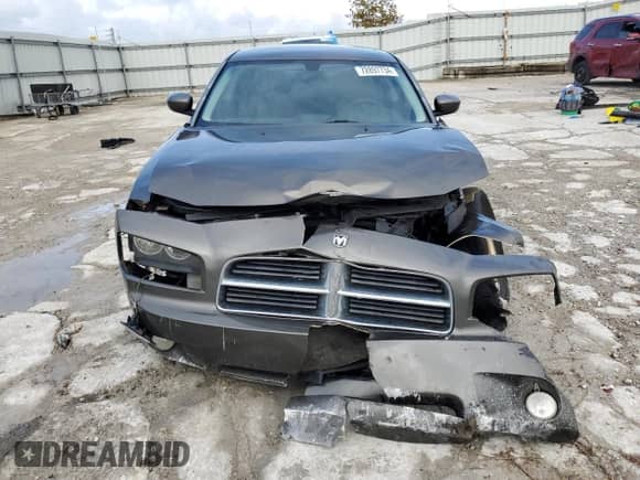 2010 Dodge Charger SXT с VIN 2B3CA3CV7AH234072, выставлен на аукционе Copart как лот 72897734 с пробегом 204 854 миль миль и Списание • Salvage title. История ставок и продаж доступна на DreamBid. Изображение 5.