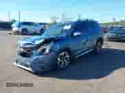 2022 Subaru Forester Touring z VIN JF2SKARC3NH432677, wystawiony jako IAAI lot #43468143 z przebiegiem 50 819 mil mil oraz . Historia ofert i sprzedaży dostępna na DreamBid. Obrazek 18.