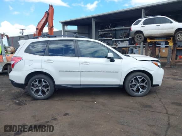 2015 Subaru Forester XT Premium with VIN JF2SJGDC8FH587305, listed as a IAAI auction lot 42397546 with 61,323 mi miles and . Bid and sale history available at DreamBid. Image 13.