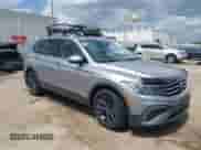 2023 Volkswagen Tiguan SE with VIN 3VVNB7AX3PM023303, listed as a IAAI auction lot 42459020 with 19,844 mi miles and . Bid and sale history available at DreamBid. Image 1.