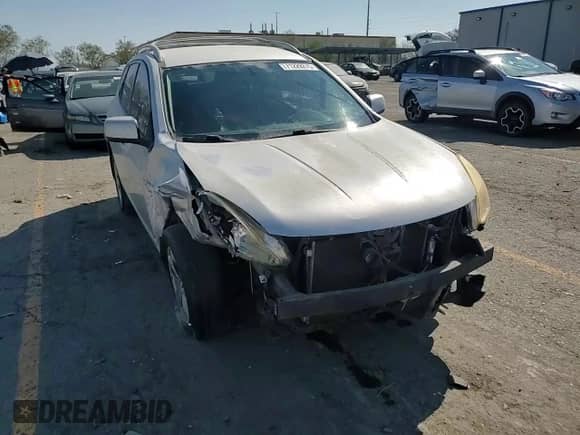 2009 Nissan Rogue SL with VIN JN8AS58T09W041396, listed as a Copart auction lot 71229275 with 191,294 mi miles and Salvage title. Bid and sale history available at DreamBid. Image 14.