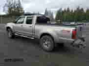 2003 Nissan Frontier XE with VIN 1N6ED29Y43C414977, listed as a Copart auction lot 43938595 with 212,303 mi miles and Salvage title. Bid and sale history available at DreamBid. Image 2.