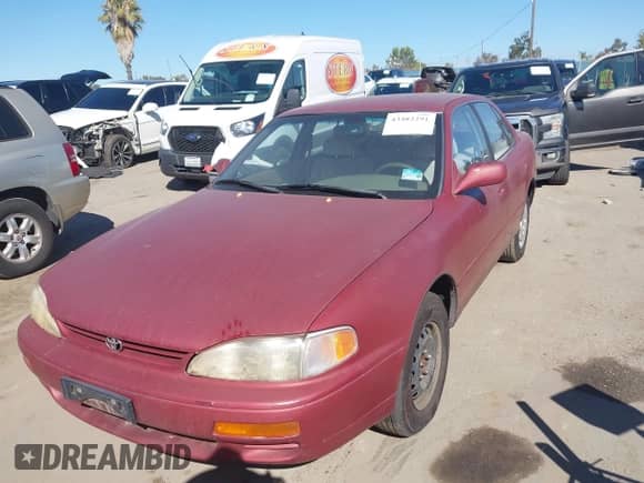 1996 Toyota Camry DX with VIN JT2BG12K2T0354205, listed as a IAAI auction lot 43482291 with 156,971 mi miles and . Bid and sale history available at DreamBid. Image 6.
