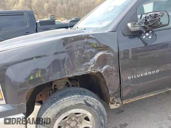2014 Chevrolet Silverado 1500 Work Truck z VIN 1GCNKPEC6EZ296723, wystawiony jako IAAI lot #42026115 z przebiegiem 247 718 mil mil oraz . Historia ofert i sprzedaży dostępna na DreamBid. Obrazek 19.