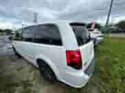 2014 Dodge Grand Caravan SXT with VIN 2C4RDGCG6ER412434, listed as a Copart auction lot 86316495 with 144,803 mi miles and Clean title. Bid and sale history available at DreamBid. Image 3.