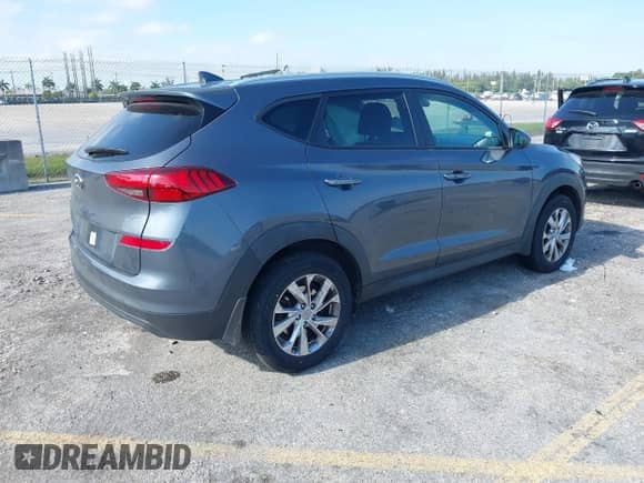 2021 Hyundai Tucson Value with VIN KM8J33A40MU323196, listed as a IAAI auction lot 42051007 with 84,446 mi miles and . Bid and sale history available at DreamBid. Image 4.