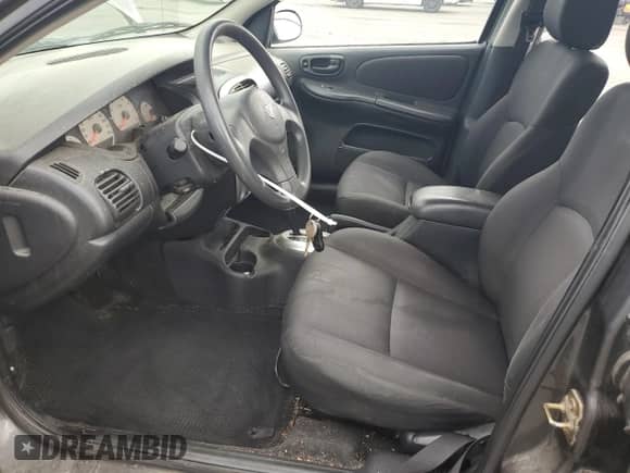 2003 Dodge Neon SXT with VIN 1B3ES56C93D252200, listed as a Copart auction lot 84660075 with 179,726 mi miles and Salvage title. Bid and sale history available at DreamBid. Image 7.