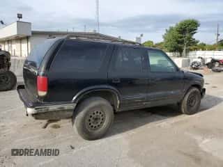 1997 Chevrolet Blazer LS z VIN 1GNDT13W2V2128712, wystawiony jako Copart lot #69841254 z przebiegiem 196 720 mil mil oraz Szkoda całkowita • Salvage title. Historia ofert i sprzedaży dostępna na DreamBid. Obrazek 3.