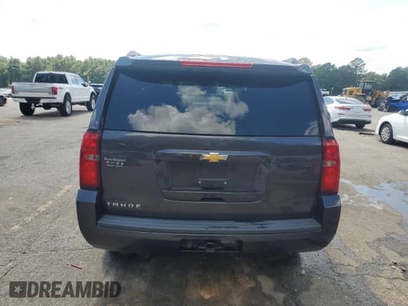 2015 Chevrolet Tahoe LS с VIN 1GNSCAEC6FR682385, выставлен на аукционе Copart как лот 68130335 с пробегом 112 898 миль миль и Списание • Salvage title. История ставок и продаж доступна на DreamBid. Изображение 6.