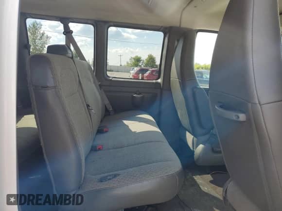2023 Chevrolet Express Passenger LS с VIN 1GAZGNFP5P1138053, выставлен на аукционе Copart как лот 69814074 с пробегом 19 516 миль миль и Списание • Salvage title. История ставок и продаж доступна на DreamBid. Изображение 11.