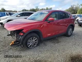 2022 Mazda CX-5 S Preferred z VIN JM3KFBCM5N0560242, wystawiony jako Copart lot #85097295 z przebiegiem 9 792 mil mil oraz Szkoda całkowita • Salvage title. Historia ofert i sprzedaży dostępna na DreamBid. Obrazek 1.