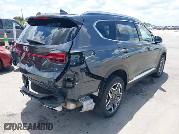 2023 Hyundai Santa Fe Limited z VIN 5NMS44AL9PH652171, wystawiony jako IAAI lot #43012448 z przebiegiem 15 345 mil mil oraz . Historia ofert i sprzedaży dostępna na DreamBid. Obrazek 4.